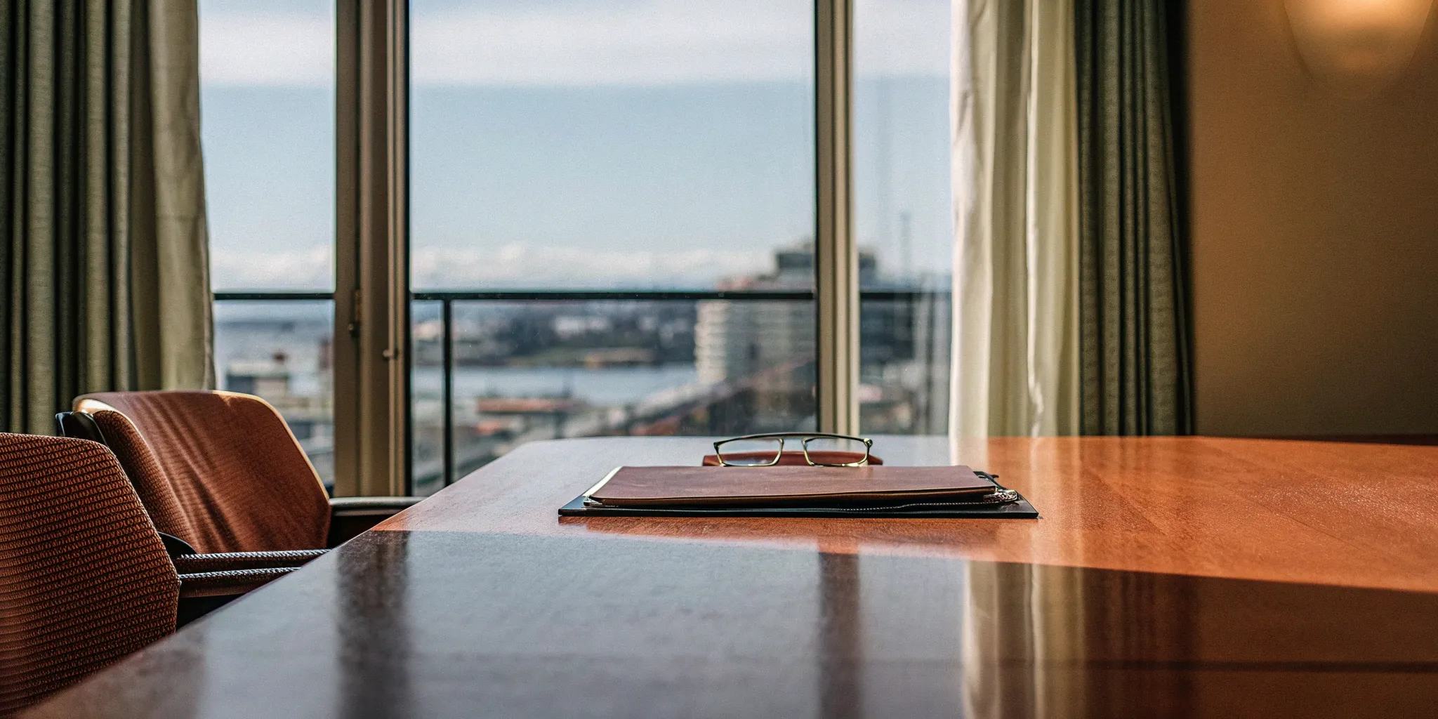 Business documents on a table outlining the benefits of captive insurance.