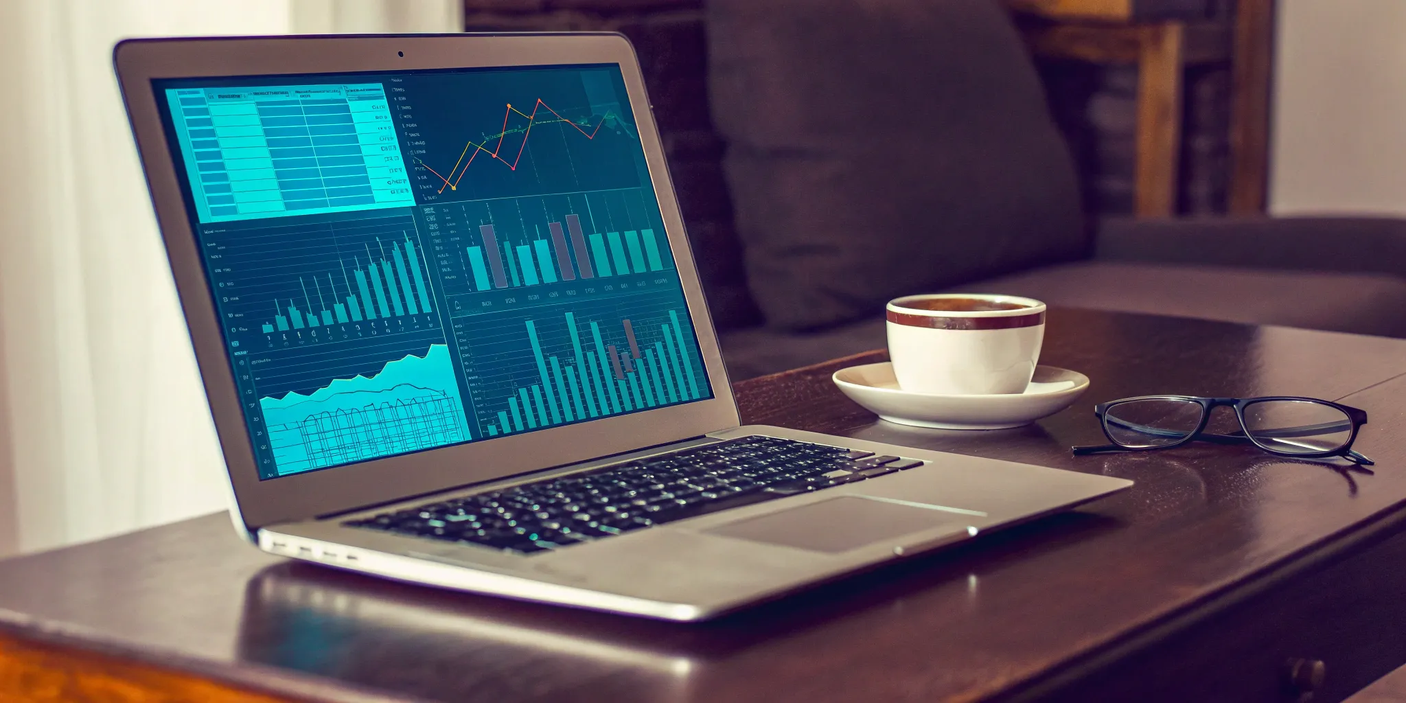 Online benefits enrollment system dashboard on a laptop.