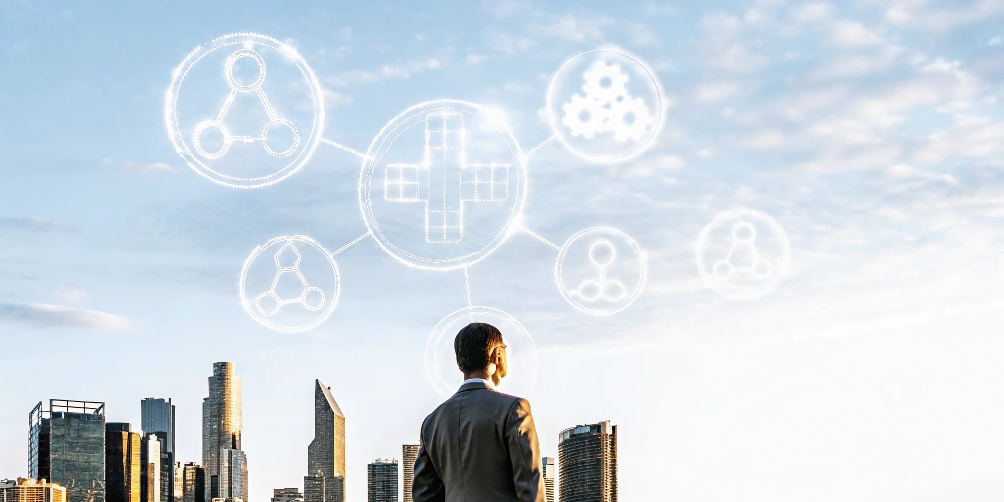 Business leader reviewing a group captive health insurance network over a city skyline.