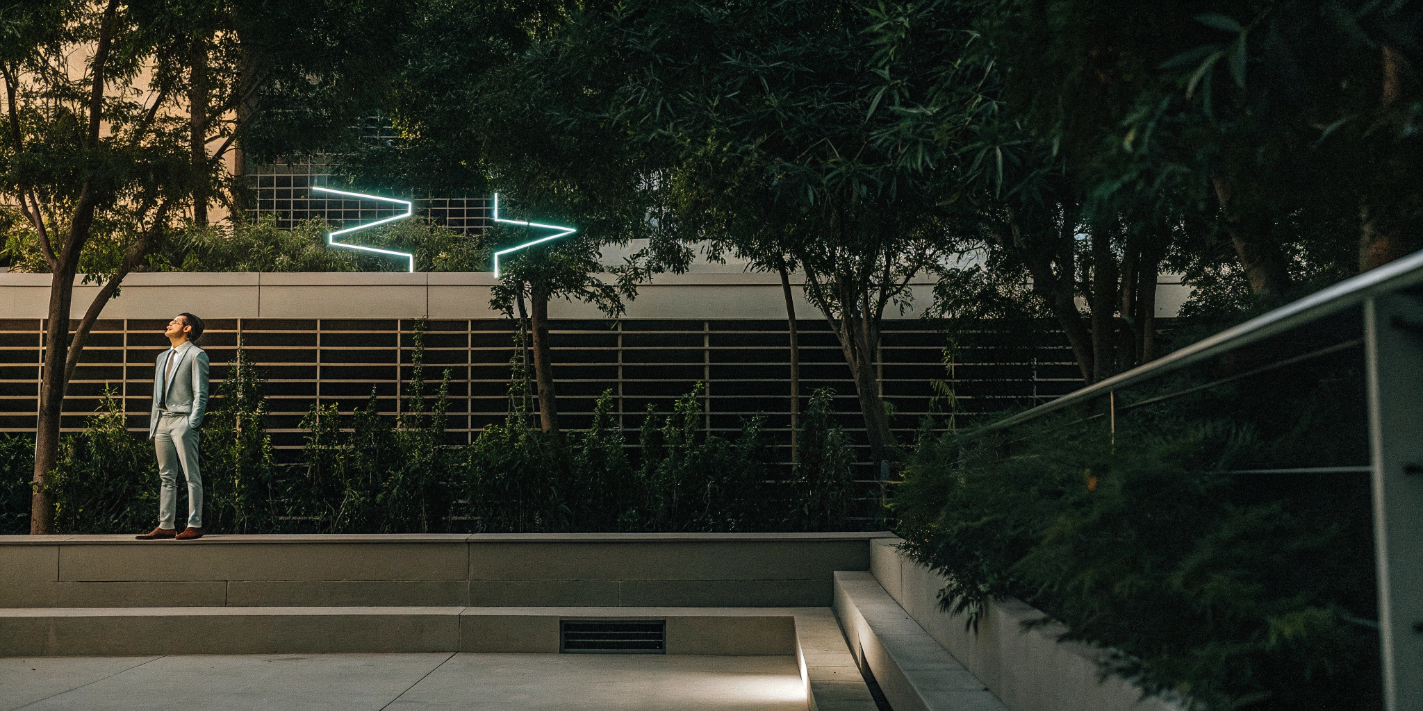 A neon arrow guides a business owner's decision between an HRA vs a QSEHRA.