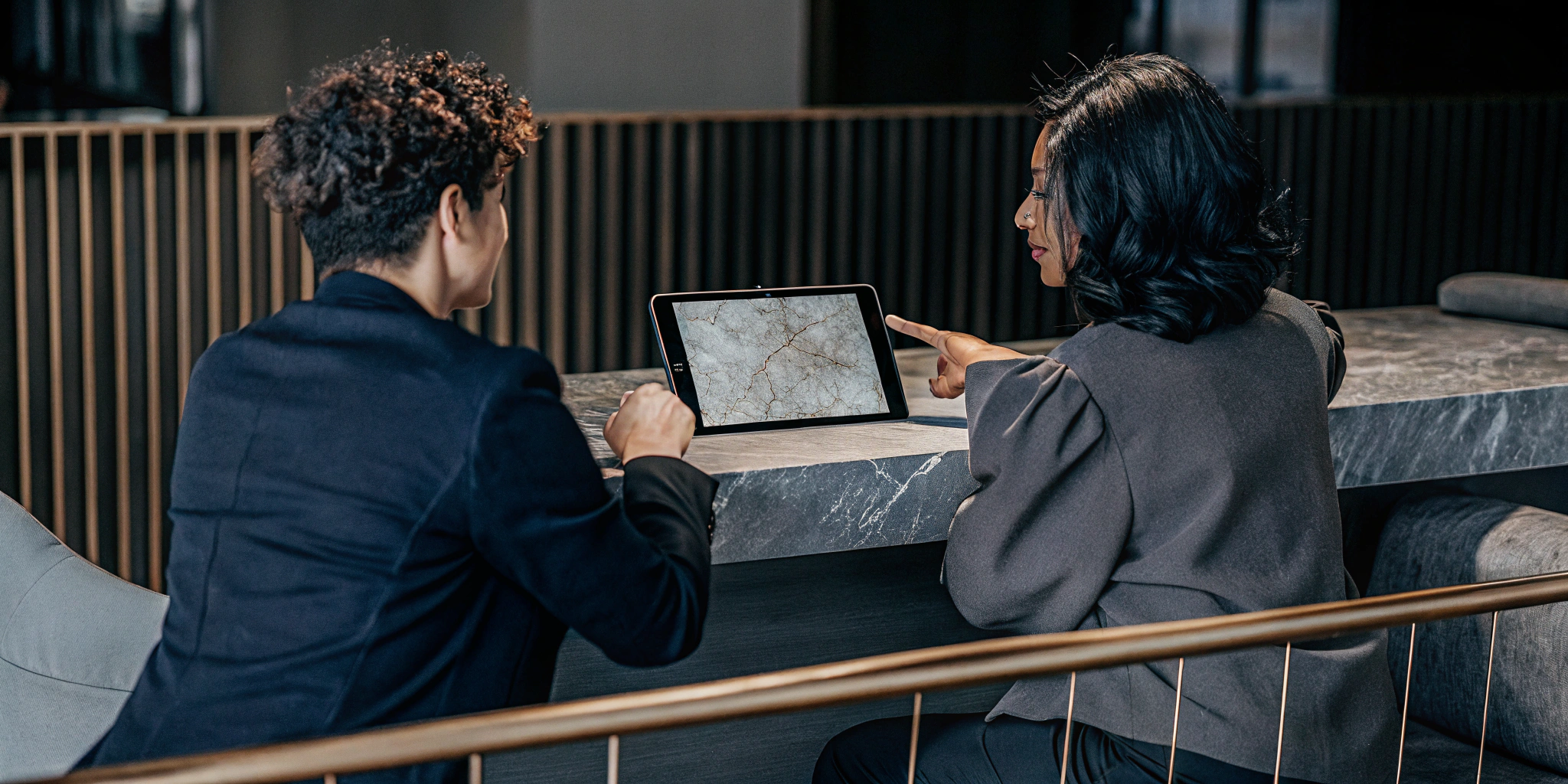 Two Washington employees discussing their company's EAP program options.