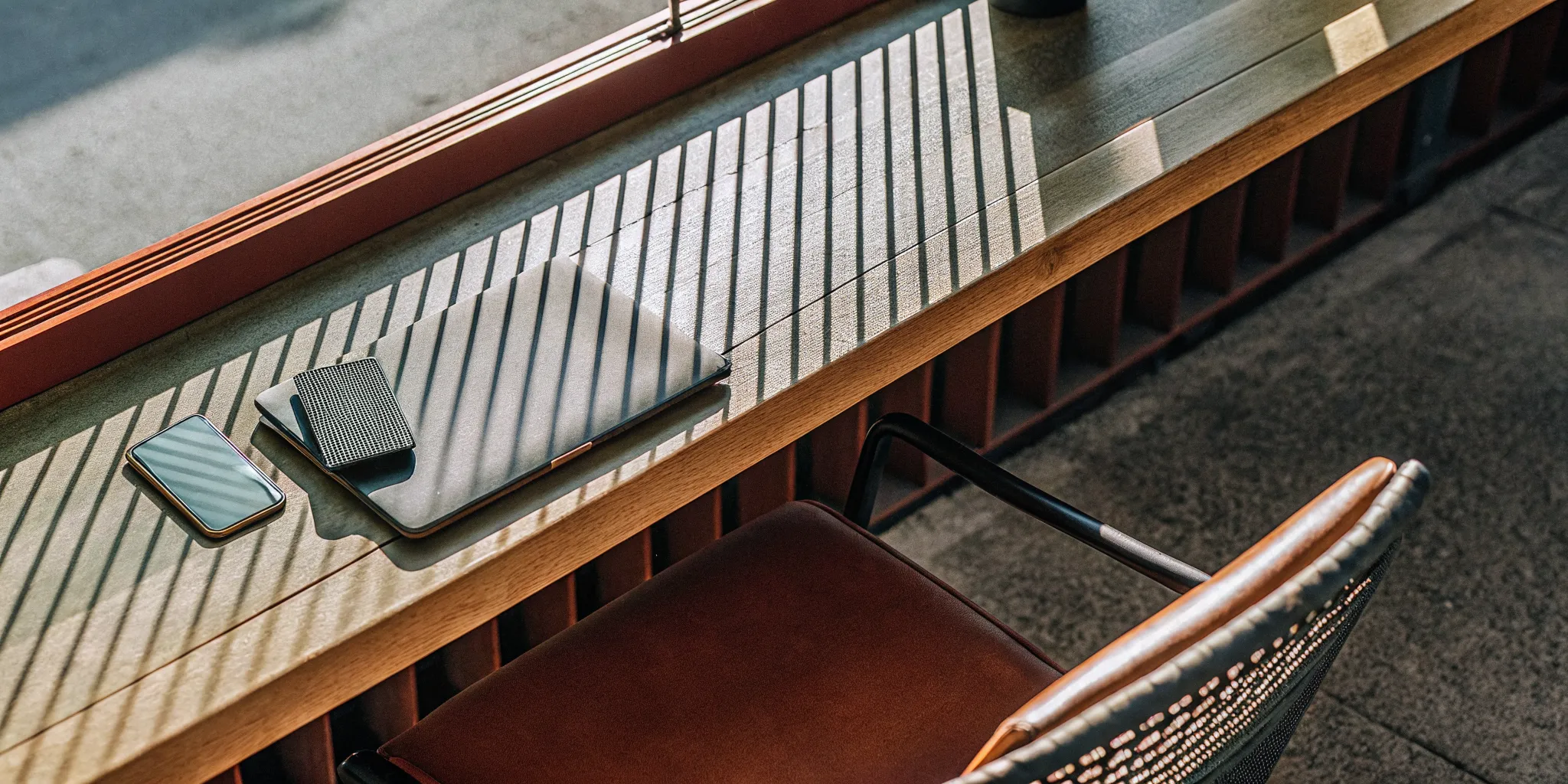 A laptop on a desk for a small business HRA setup.